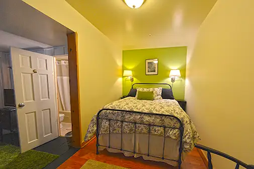 Pet-friendly M2 room with outside entrance off front porch at Hyde Away Inn Vermont
