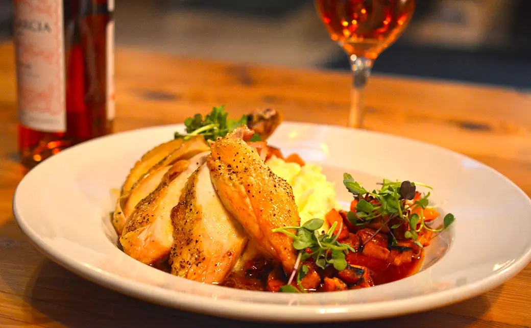 Roasted chicken entrée at Hyde Away Restaurant, serving New American cuisine in Waitsfield Vermont