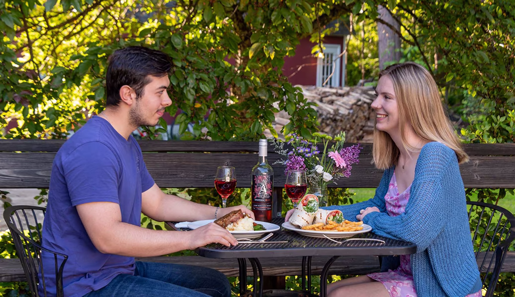 Summer outdoor dining on the deck at Hyde Away Inn, Waitsfield Vermont